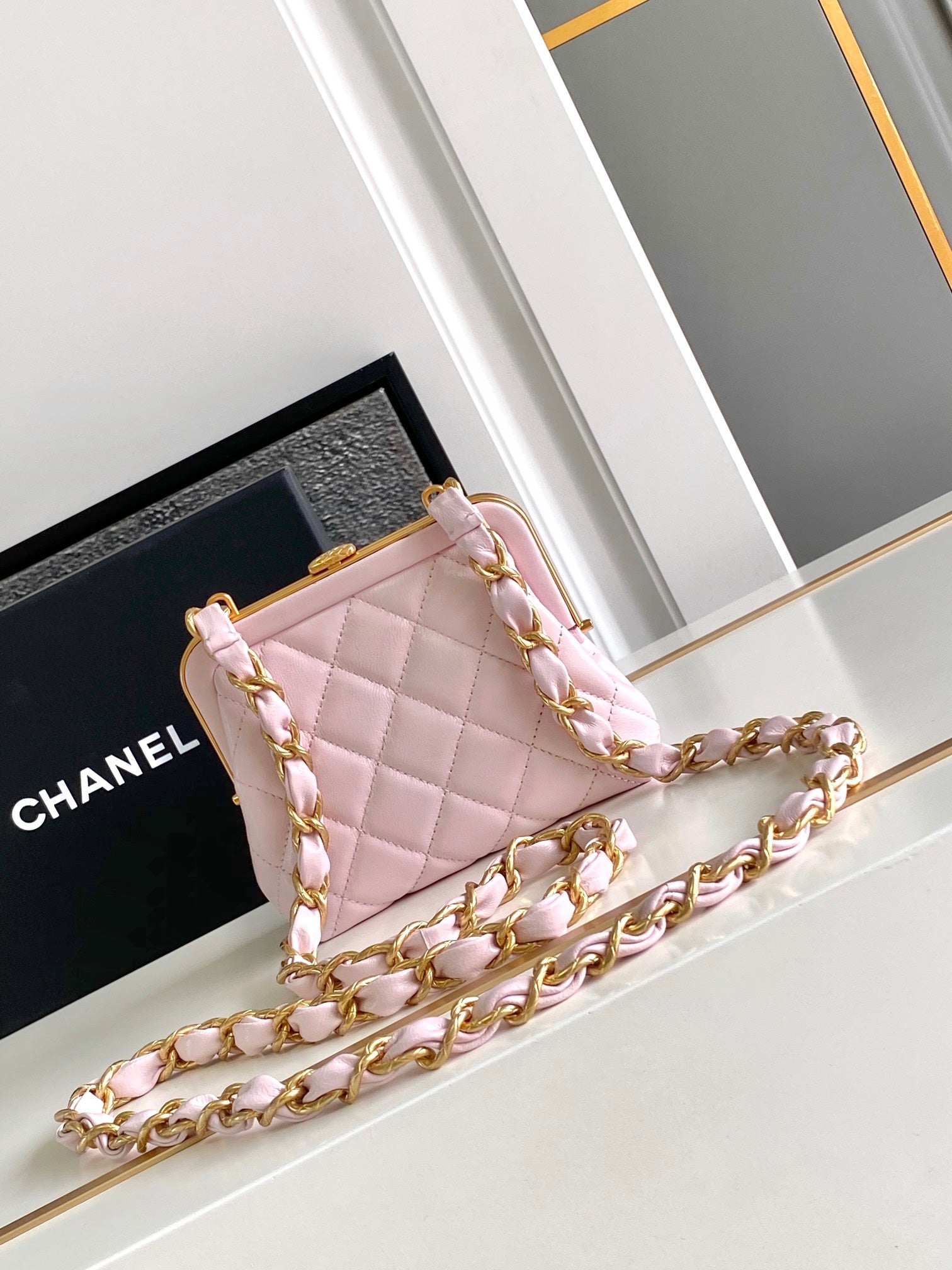 CHANEL MINI 13 CLUTCH WITH STRAP IN LIGHT PINK LAMBSKIN ATTACH BOW