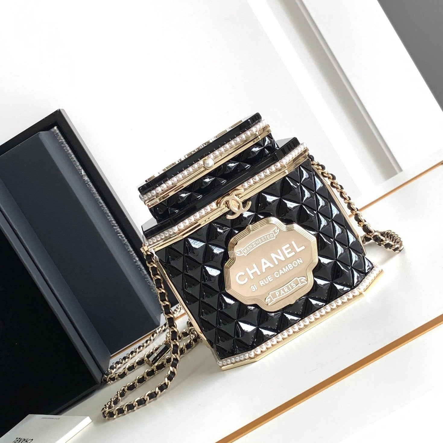 CHANEL 12 TEA BOX MINAUDIERE BAG IN BLACK RESIN