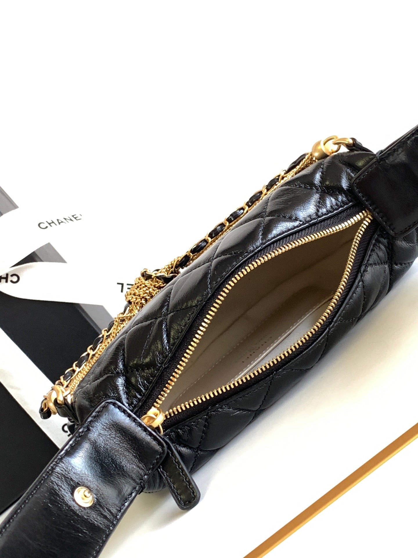 CHANEL 16 MINI POUCH IN BLACK GRAINED CALFSKIN AND GOLD METAL