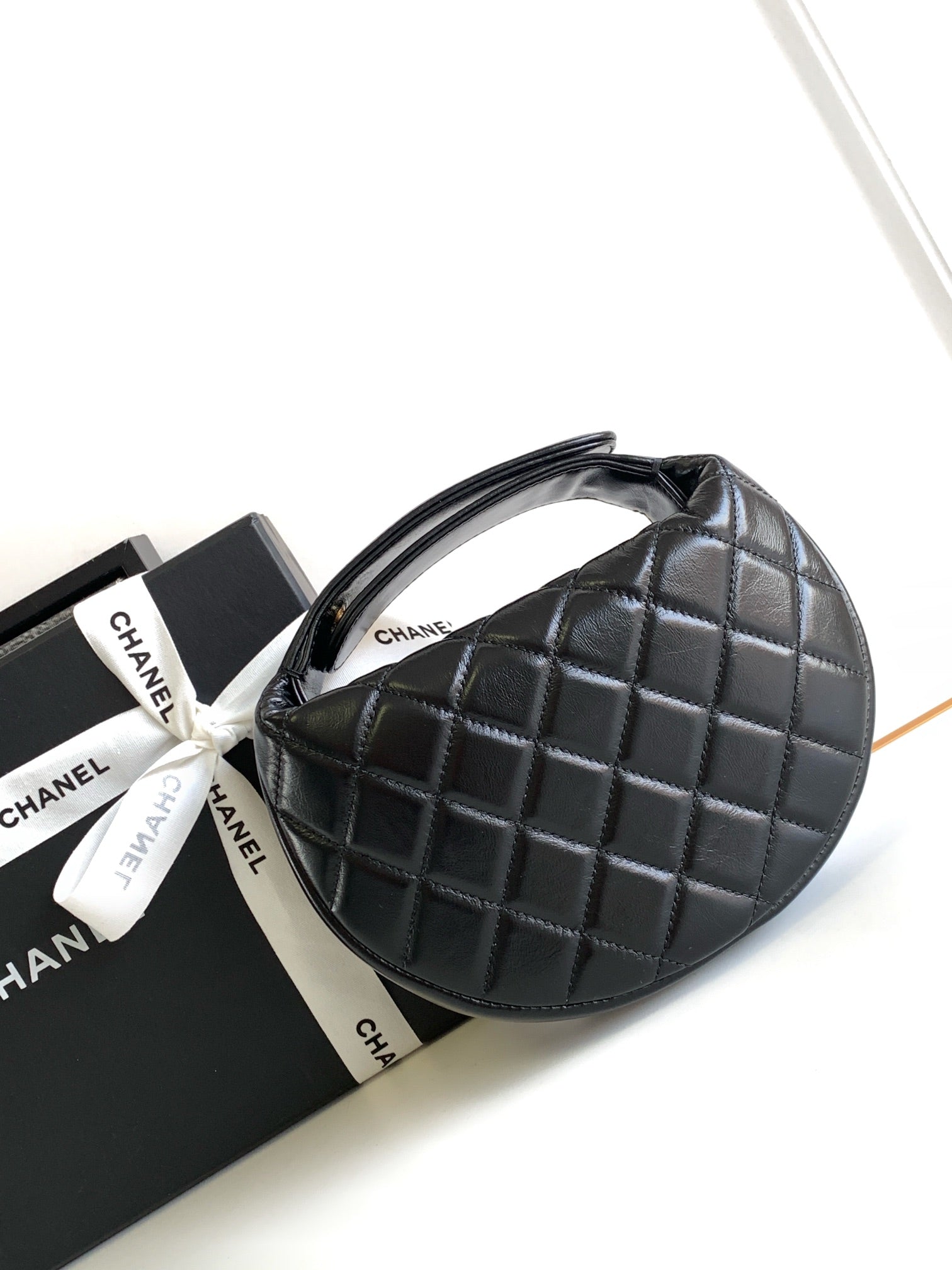 CHANEL 16 MINI POUCH IN BLACK GRAINED CALFSKIN AND GOLD METAL