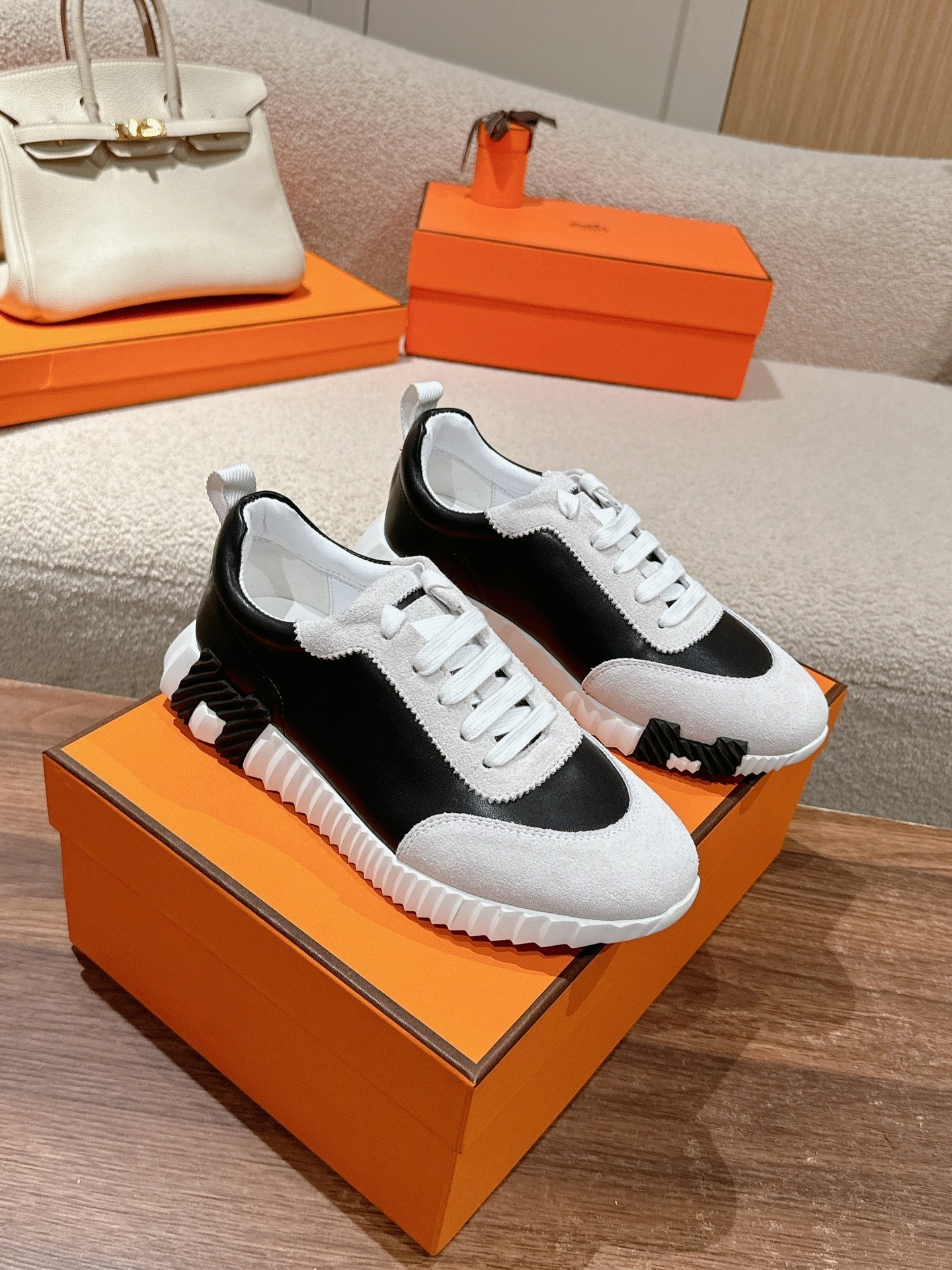 HERMES MAINLAND SNEAKER IN PALE GRAY SUEDE AND BLACK CALFSKIN
