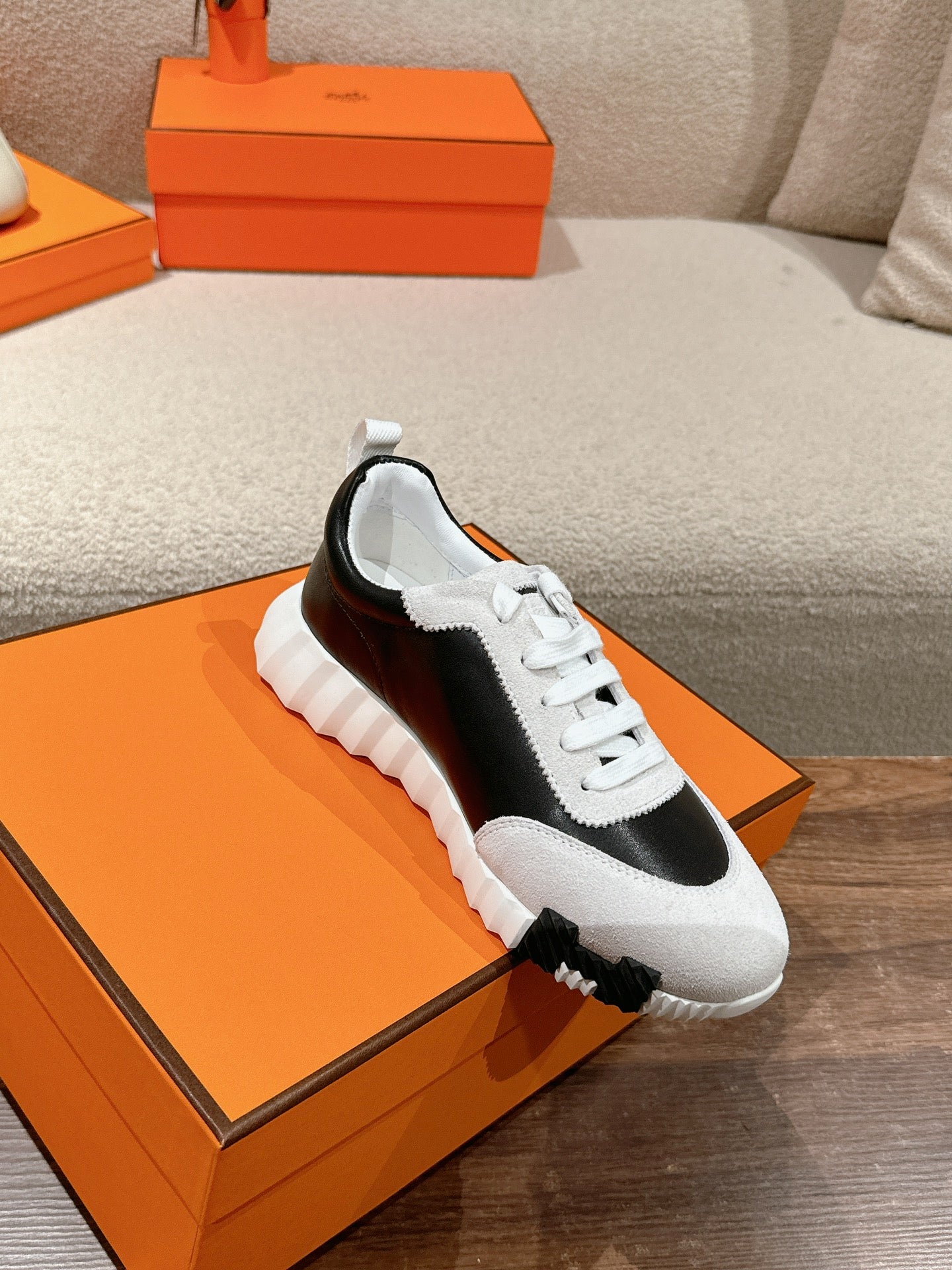 HERMES MAINLAND SNEAKER IN PALE GRAY SUEDE AND BLACK CALFSKIN