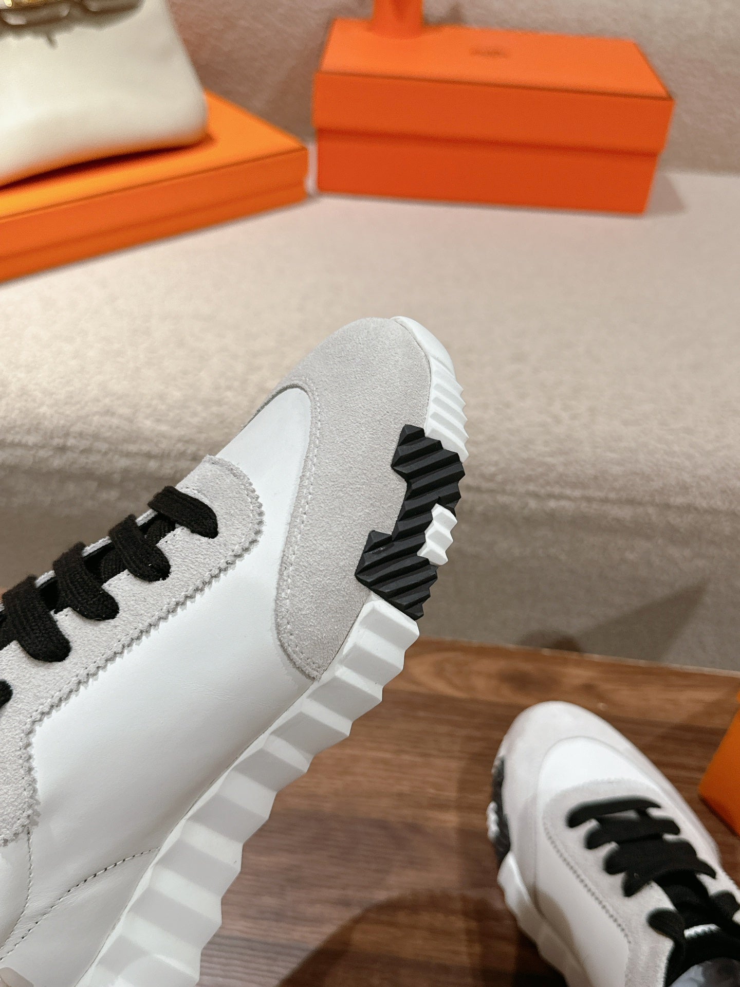 HERMES MAINLAND SNEAKER IN PALE GRAY SUEDE AND WHITE CALFSKIN