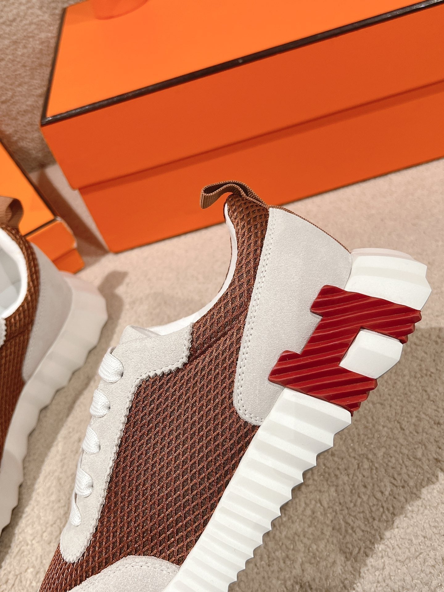 HERMES MAINLAND SNEAKER IN PALE GRAY SUEDE AND CARAMEL BROWN BREATHABLE MESH FABRIC