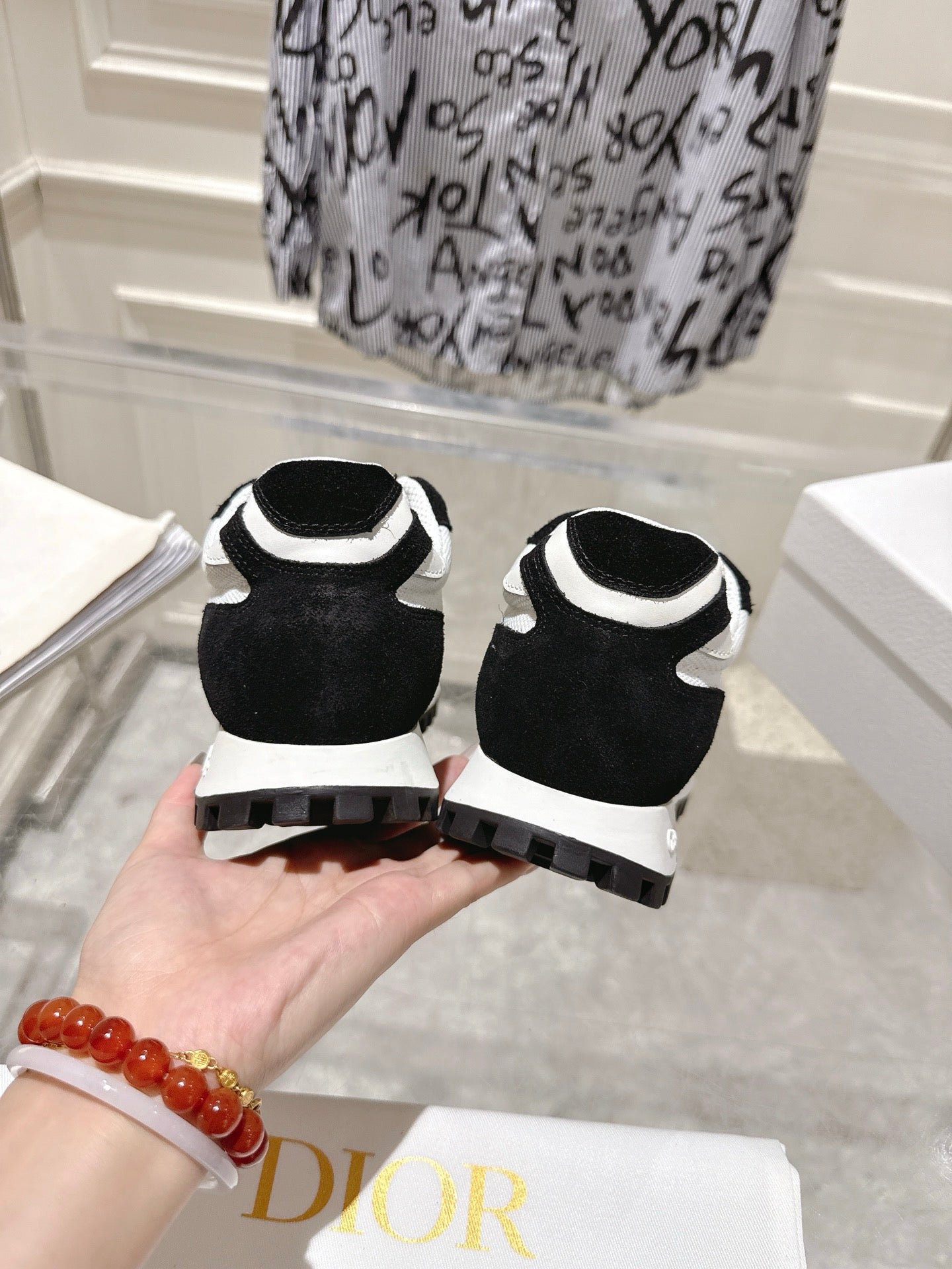 DIOR 25S C'EST  SNEAKER IN WHITE BLACK CALFSKIN AND SUEDE