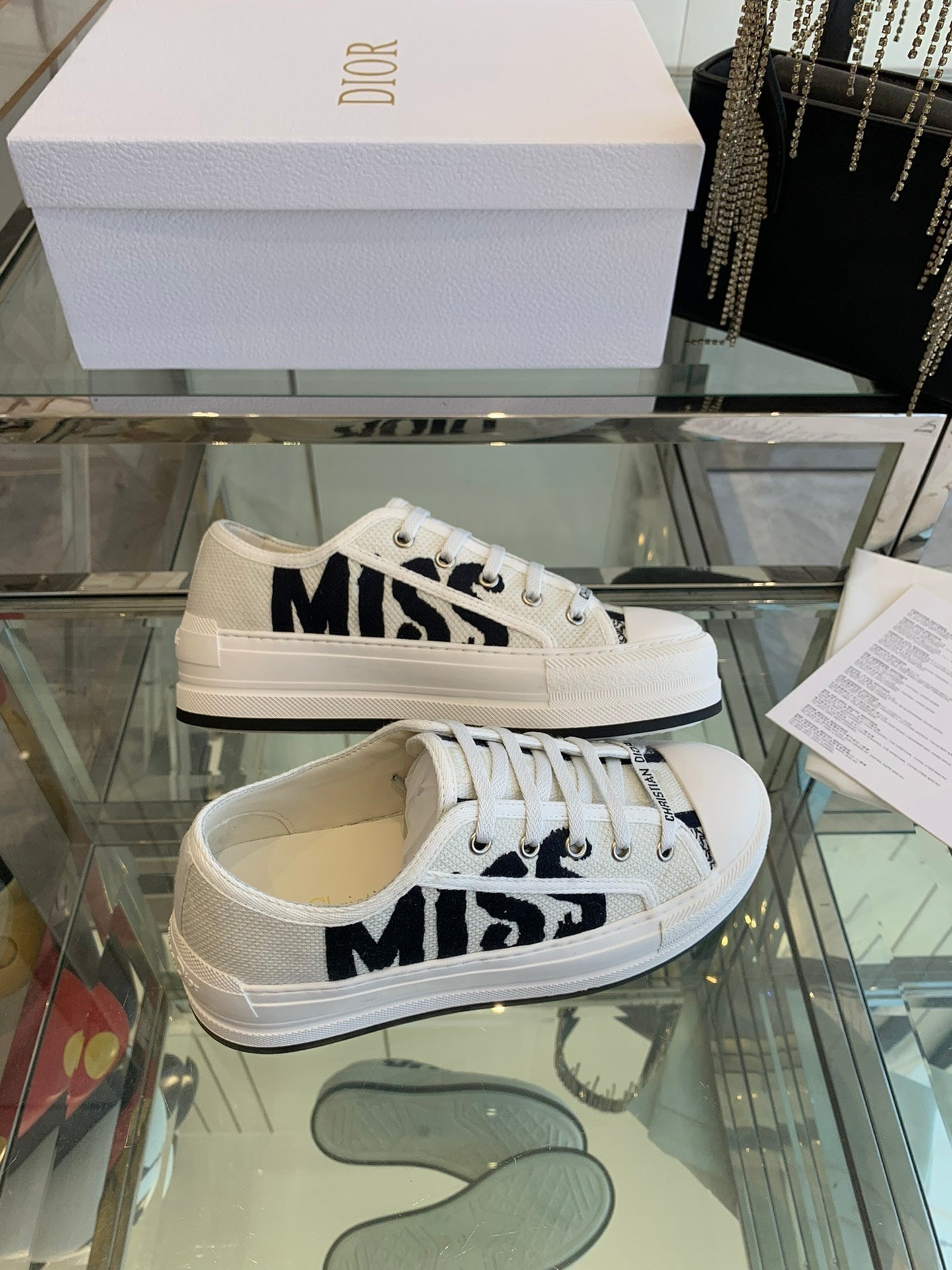 DIOR WALK'N PLATFORM SNEAKER IN WHITE AND BLACK EMBROIDERED COTTON