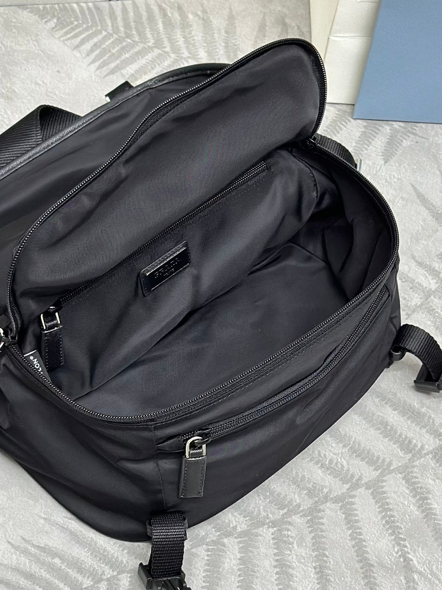 PRADA SHOULDER BAG 27 IN BLACK RE-NYLON TRIANGLE LOGO