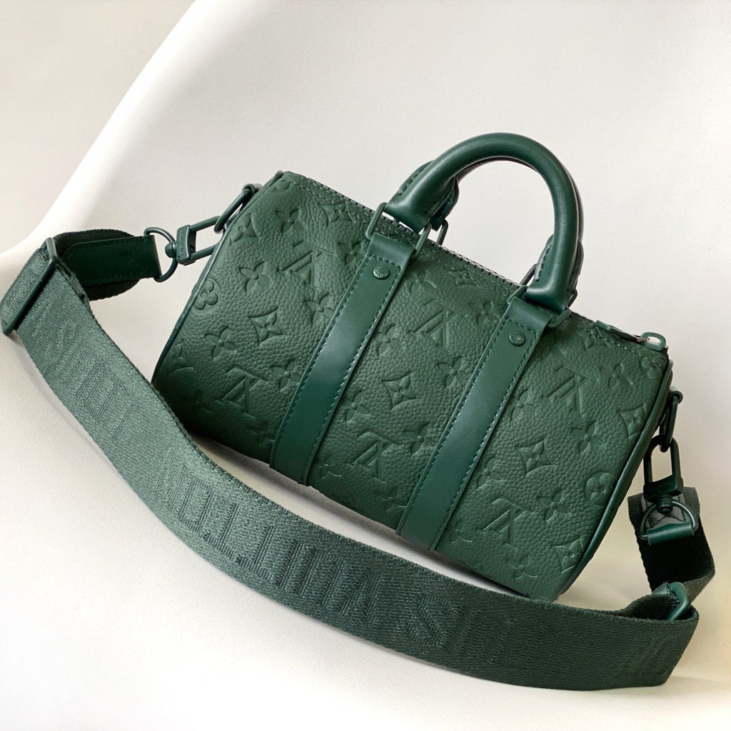 LOUIS VUITTON KEEPALL BANDOULIÈRE 25 IN FOREST GREEN MONOGRAM EMBOSSED CALFSKIN