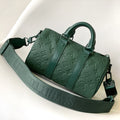 LOUIS VUITTON KEEPALL BANDOULIÈRE 25 IN FOREST GREEN MONOGRAM EMBOSSED CALFSKIN