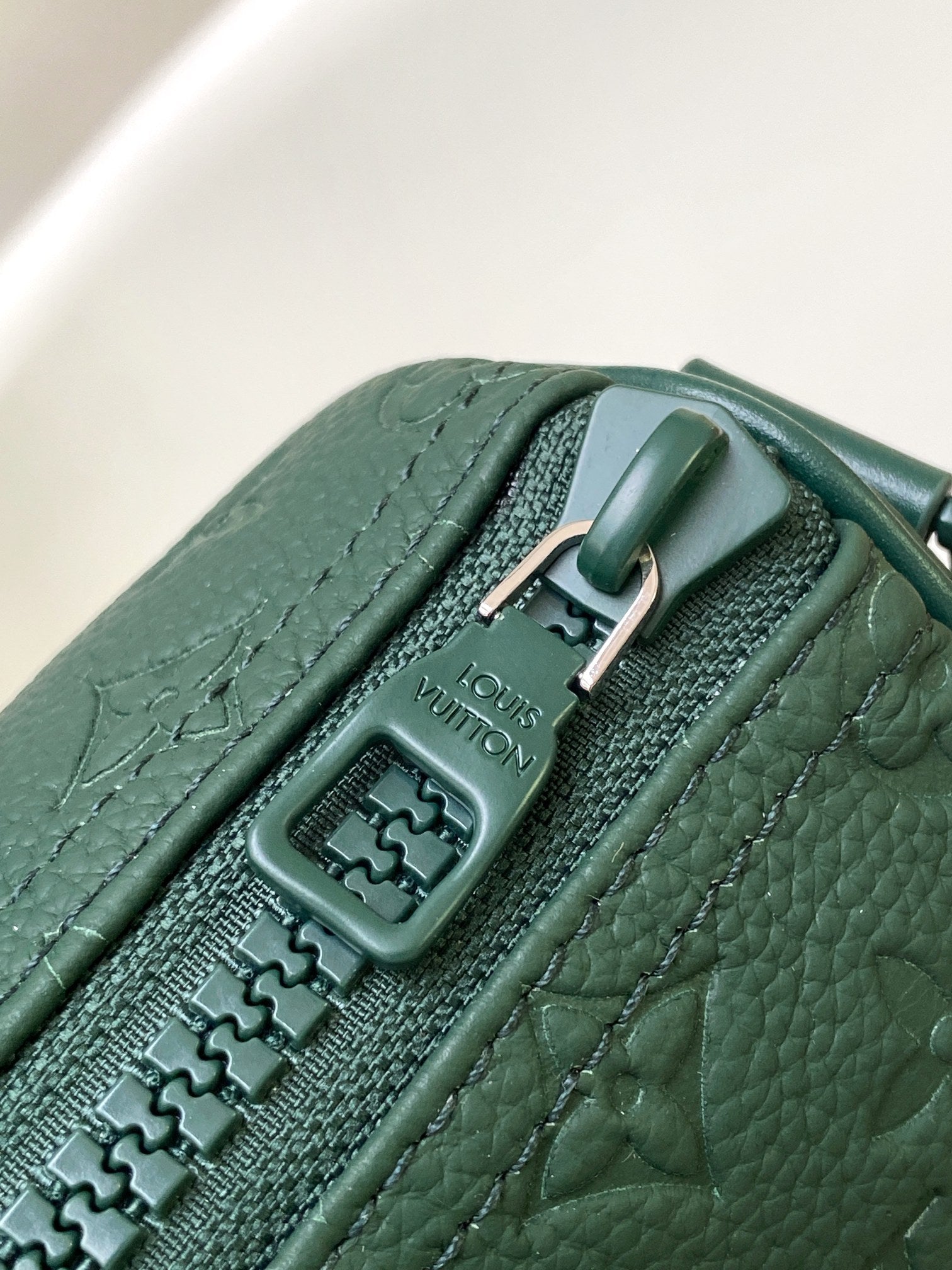 LOUIS VUITTON KEEPALL BANDOULIÈRE 25 IN FOREST GREEN MONOGRAM EMBOSSED CALFSKIN