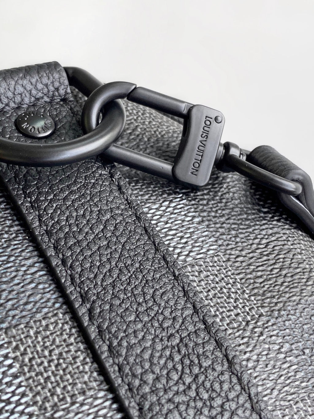 LOUIS VUITTON LV 25S KEEPALL BANDOULIÈRE 25 BAG IN DAMOFLAGE BLACK CALFSKIN