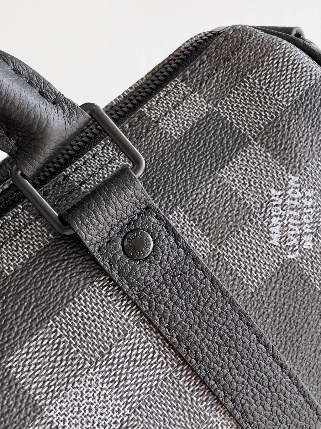 LOUIS VUITTON LV 25S KEEPALL BANDOULIÈRE 25 BAG IN DAMOFLAGE BLACK CALFSKIN