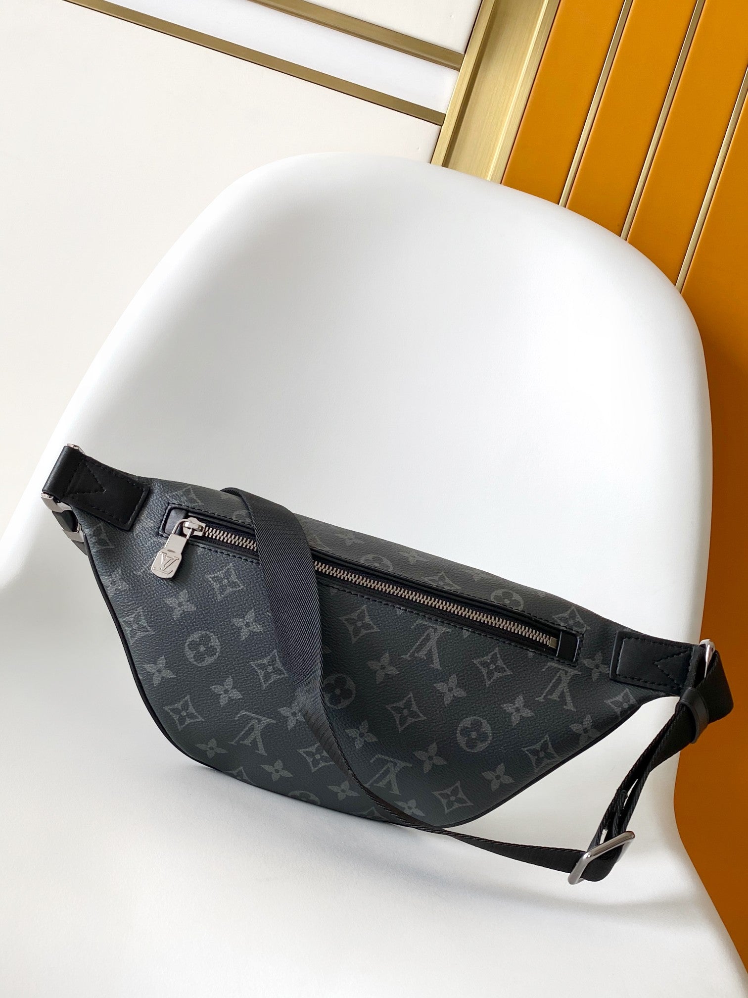 LOUIS VUITTON LV 25S DISCOVERY BUMBAG 44 IN BLACK NEON JADE MONOGRAM ECLIPSE CANVAS AND CALFSKIN