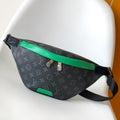 LOUIS VUITTON LV 25S DISCOVERY BUMBAG 44 IN BLACK NEON JADE MONOGRAM ECLIPSE CANVAS AND CALFSKIN