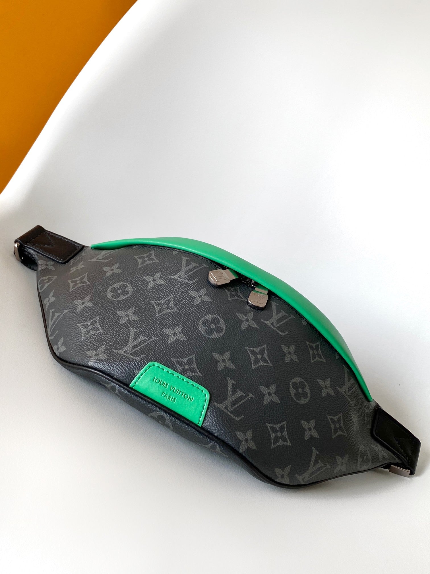 LOUIS VUITTON LV 25S DISCOVERY BUMBAG 44 IN BLACK NEON JADE MONOGRAM ECLIPSE CANVAS AND CALFSKIN