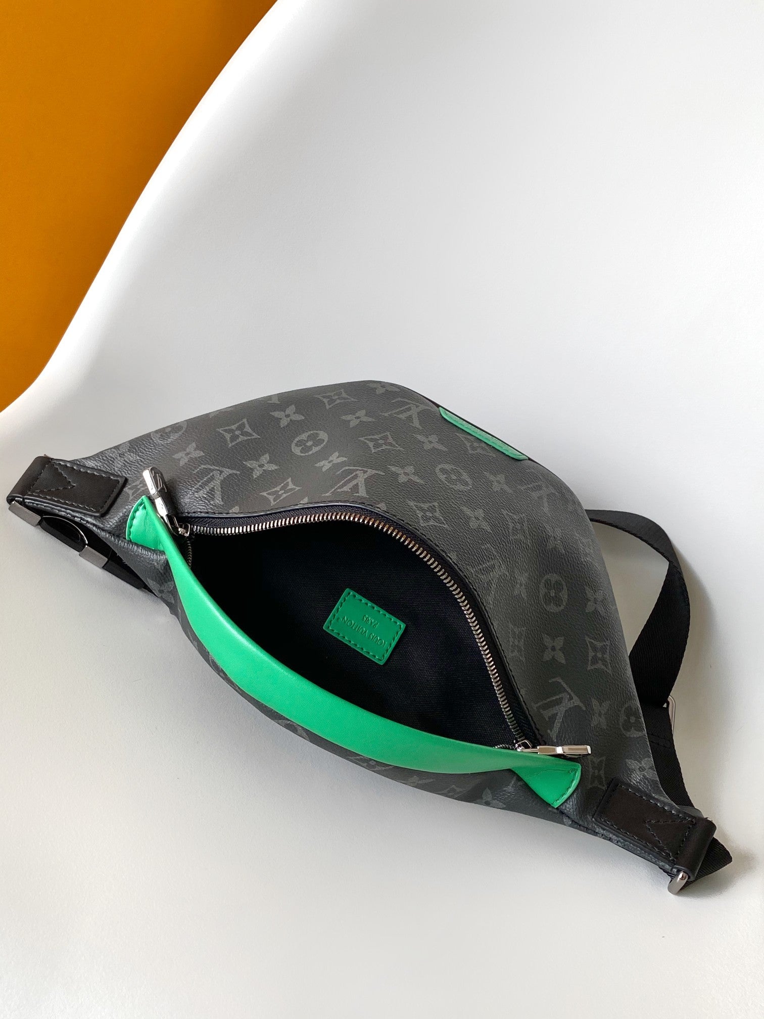 LOUIS VUITTON LV 25S DISCOVERY BUMBAG 44 IN BLACK NEON JADE MONOGRAM ECLIPSE CANVAS AND CALFSKIN