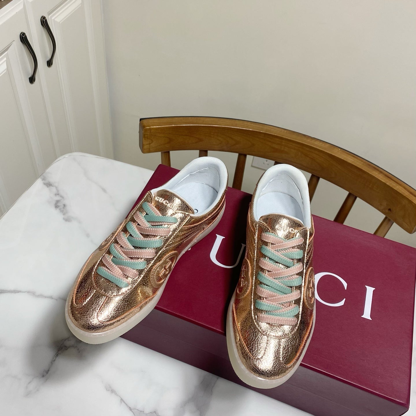 GUCCI 26S SNEAKER IN ROSE GOLD METALLIC CALFSKIN