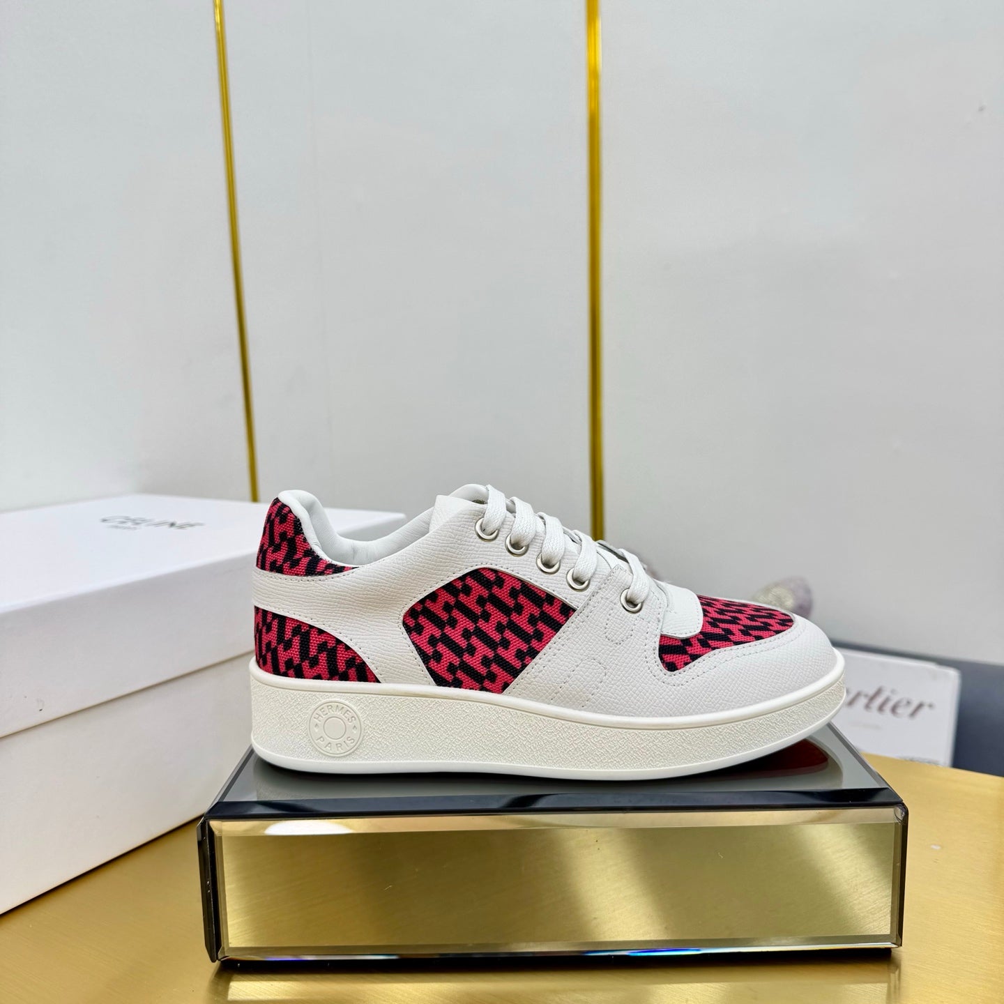 HERMES FREE SNEAKER IN WHITE CALFSKIN AND "H EN BIAIS" RED CANVAS.