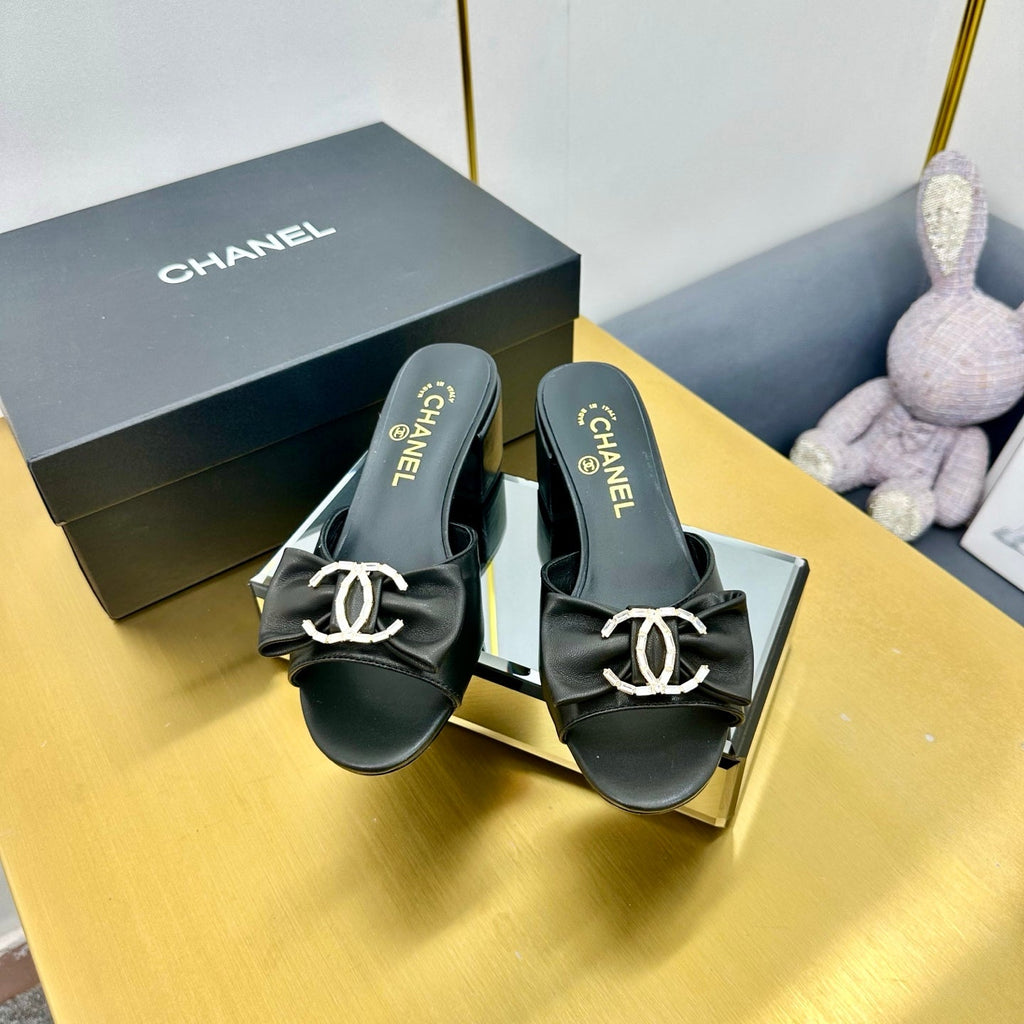 CHANEL BOWKNOT RHINESTONES MID HEEL MULE IN BLACK CALFSKIN