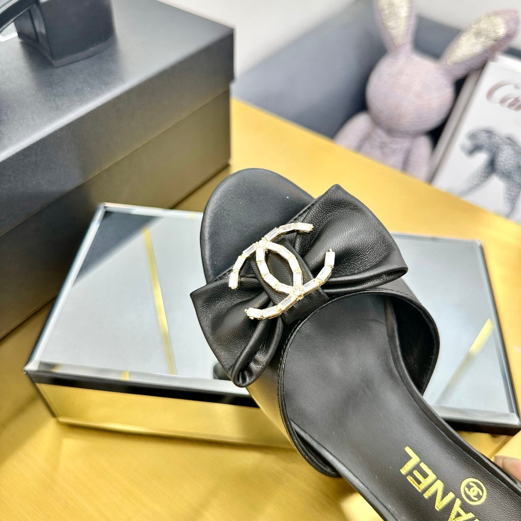 CHANEL BOWKNOT RHINESTONES MID HEEL MULE IN BLACK CALFSKIN