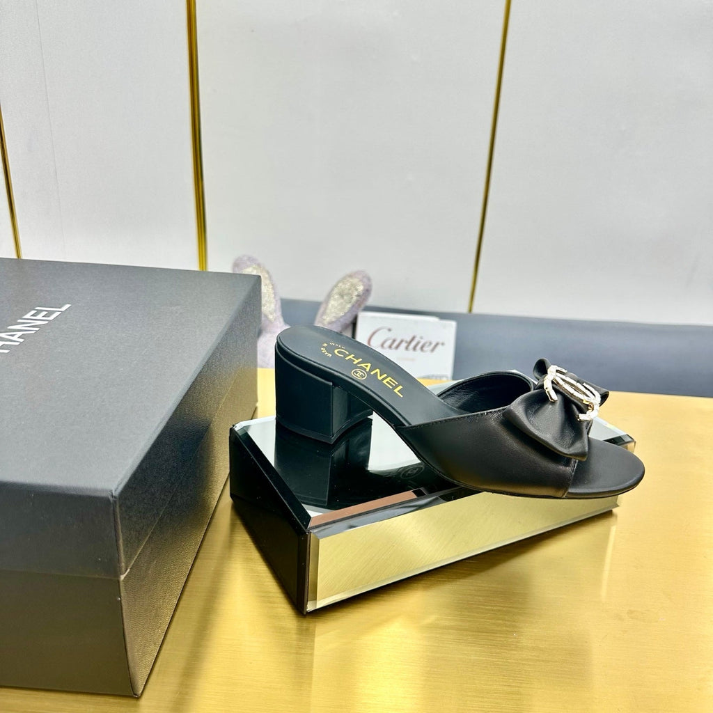 CHANEL BOWKNOT RHINESTONES MID HEEL MULE IN BLACK CALFSKIN