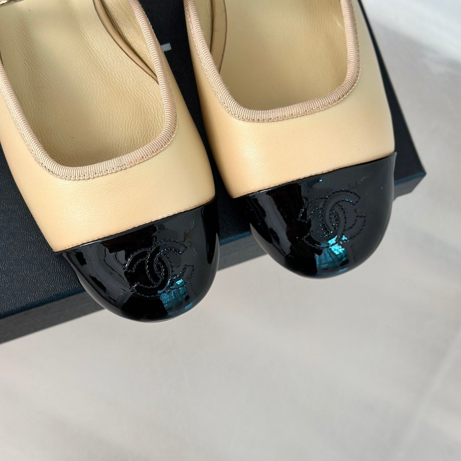 CHANEL Double C Two-Tone Chain Mules Dark Cream Lambskin