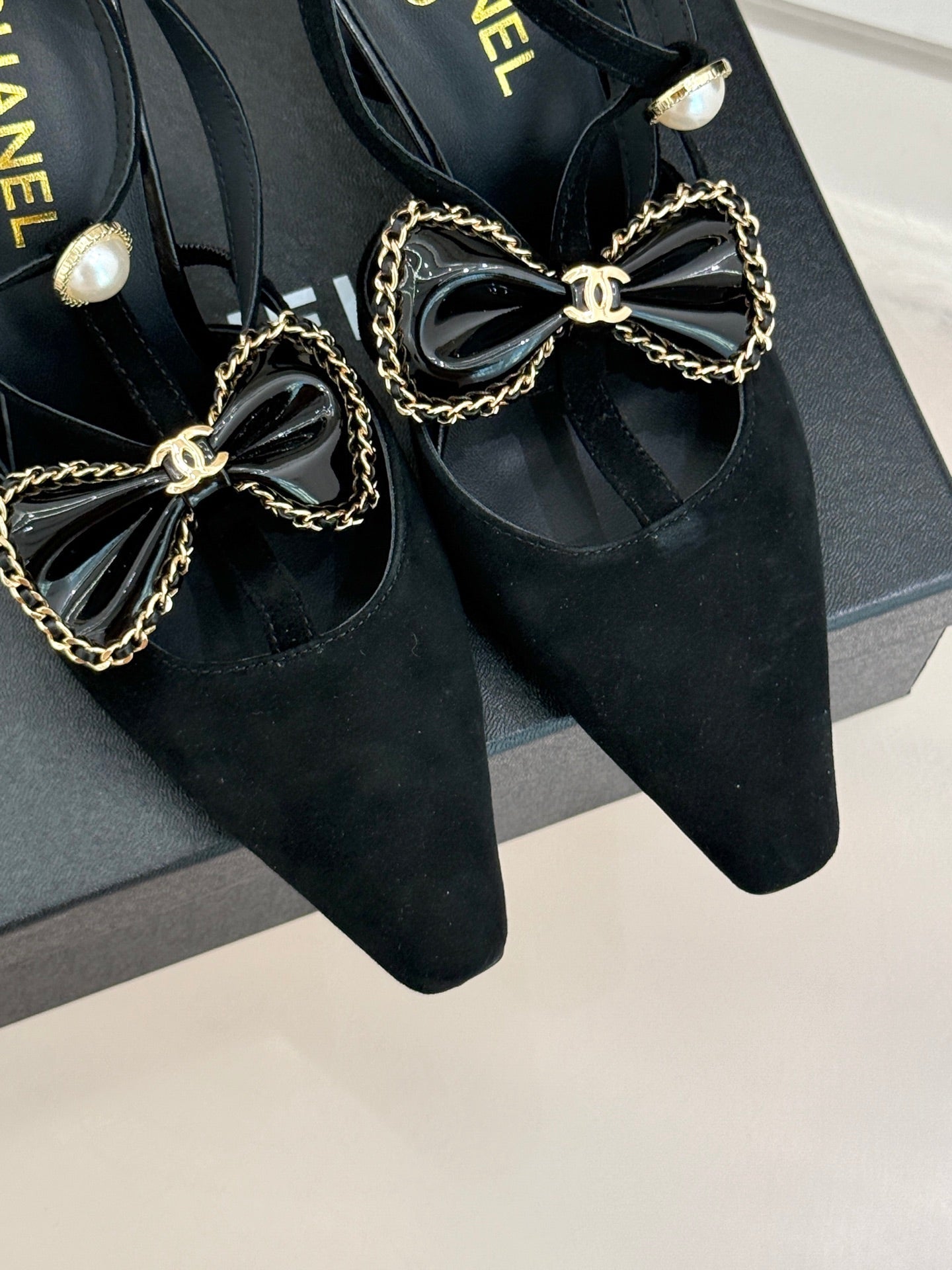 CHANEL CHAIN BOW HIGH HEEL 8 CM SLINGBACKS IN BLACK SUEDE