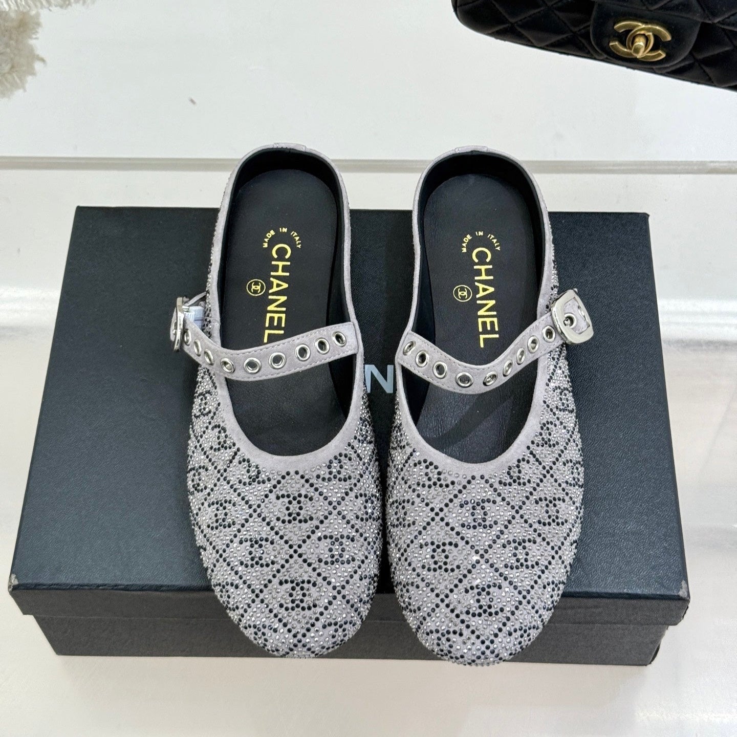 CHANEL FLAT MULES 25SS IN GREY EMBELLISHED WITH RHINESTONES