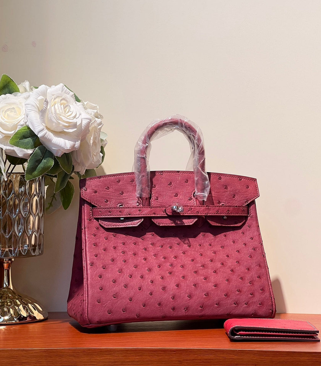 HERMES KELLY SELLIER 25 BAG IN CURRANT RED OSTRICH LEATHER WITH SILVER HARDWARE