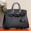 HERMES KELLY SELLIER 25 BAG IN BLACK OSTRICH LEATHER WITH WHITE RHINSTONES