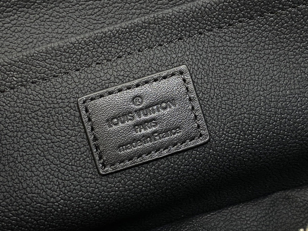 LOUIS VUITTON TOILETRY BAG 24 IN BLACK MONOGRAM EMBOSSED CALFSKIN