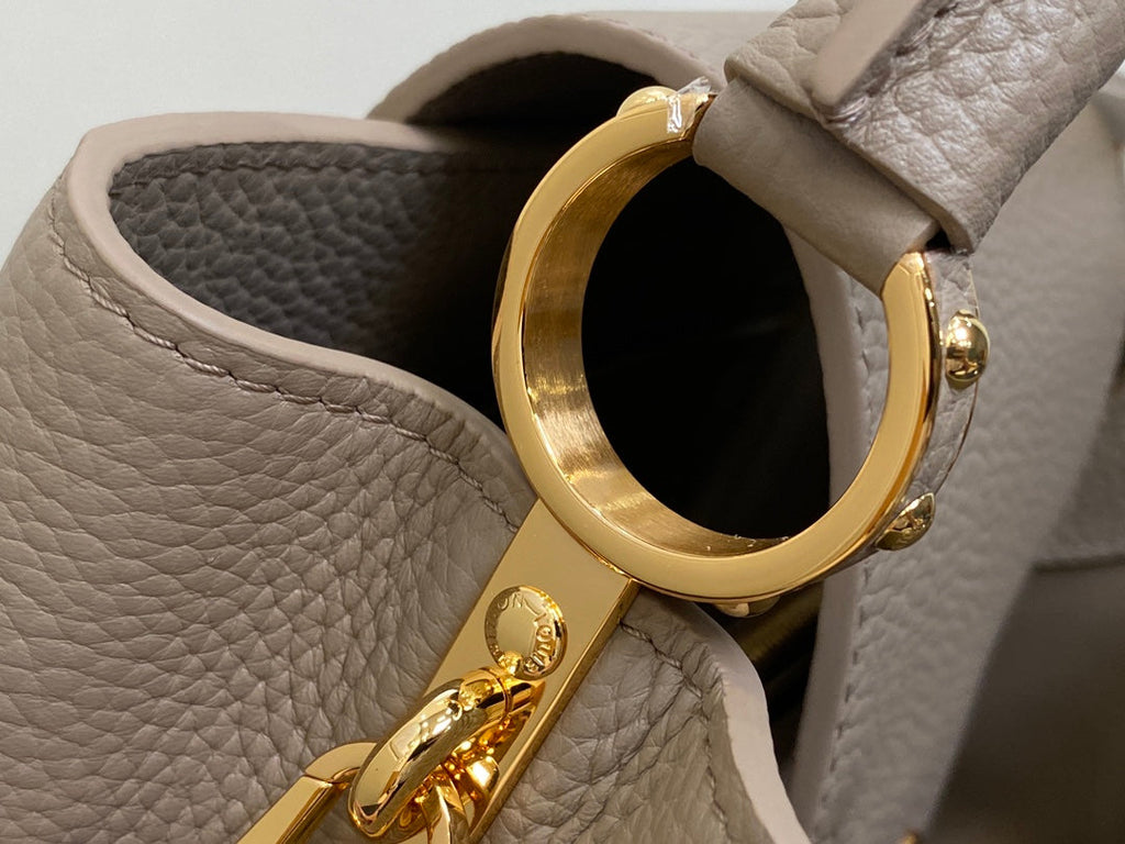 LOUIS VUITTON CAPUCINES MM 31 IN KHAKI BROWN TAURILLON