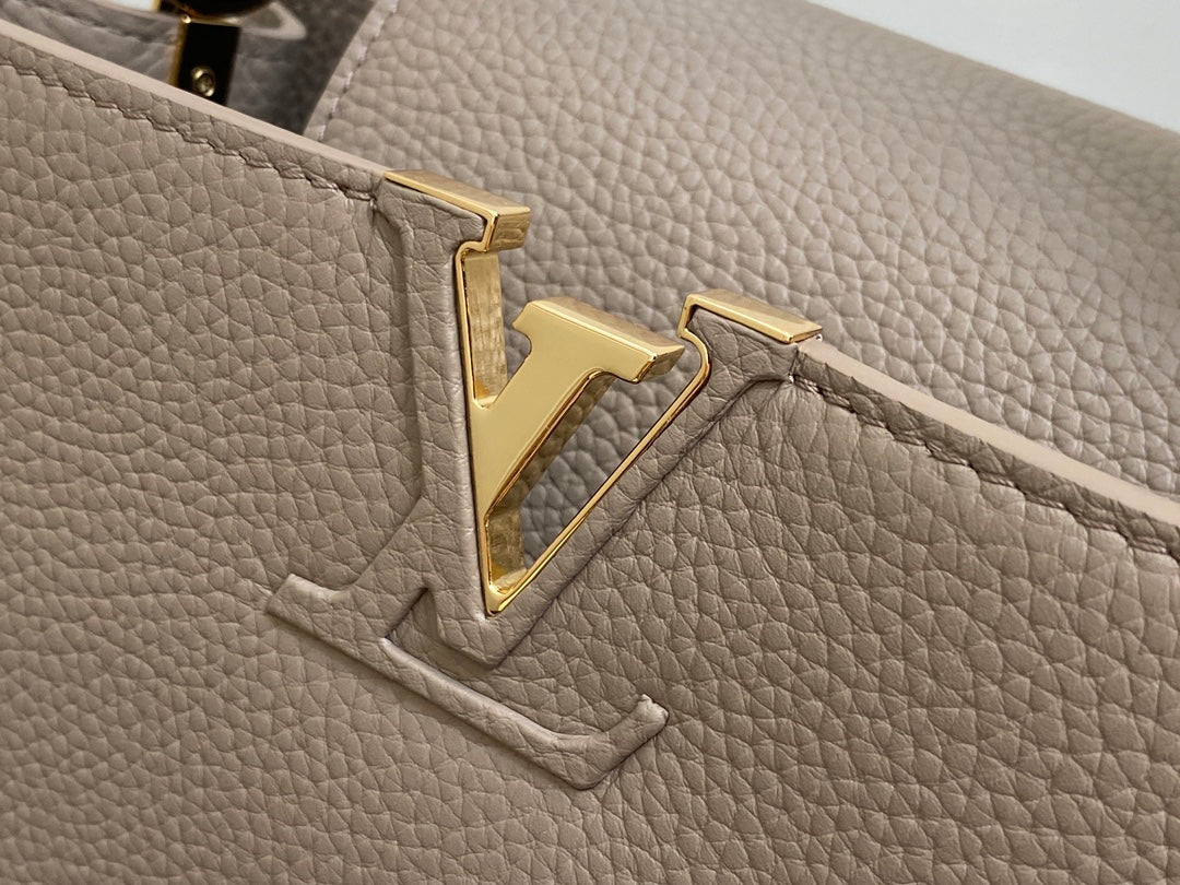 LOUIS VUITTON CAPUCINES MM 31 IN KHAKI BROWN TAURILLON