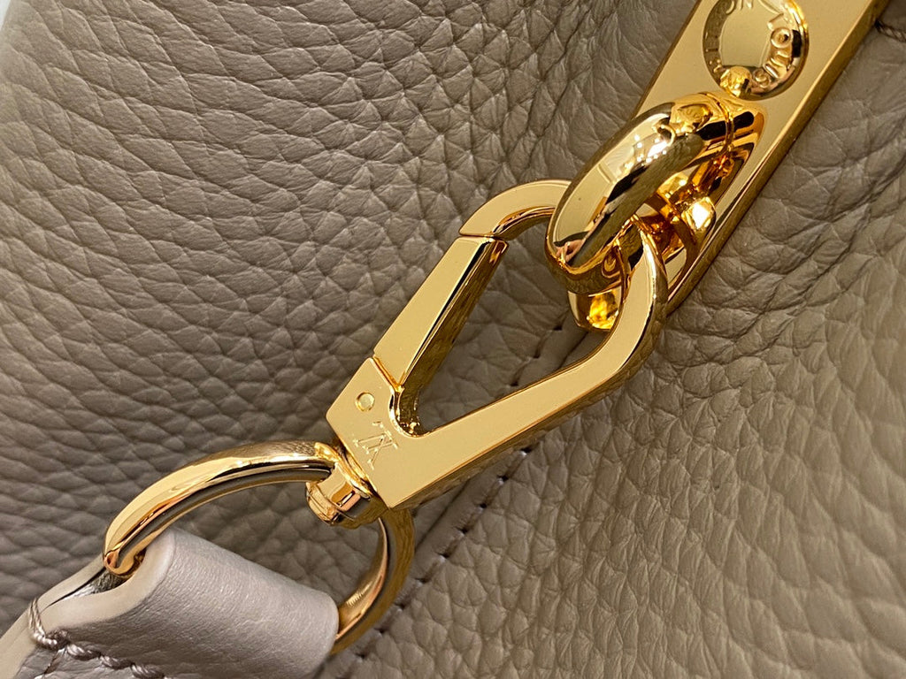 LOUIS VUITTON CAPUCINES MM 31 IN KHAKI BROWN TAURILLON
