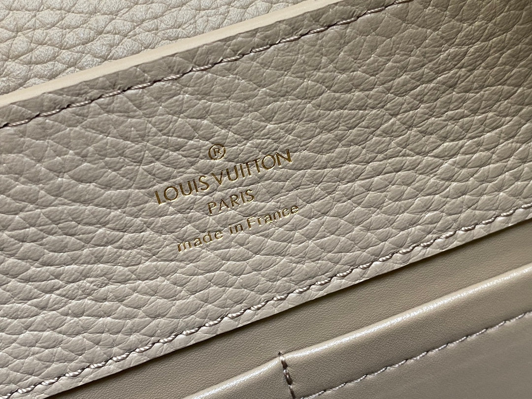 LOUIS VUITTON CAPUCINES MM 31 IN KHAKI BROWN TAURILLON