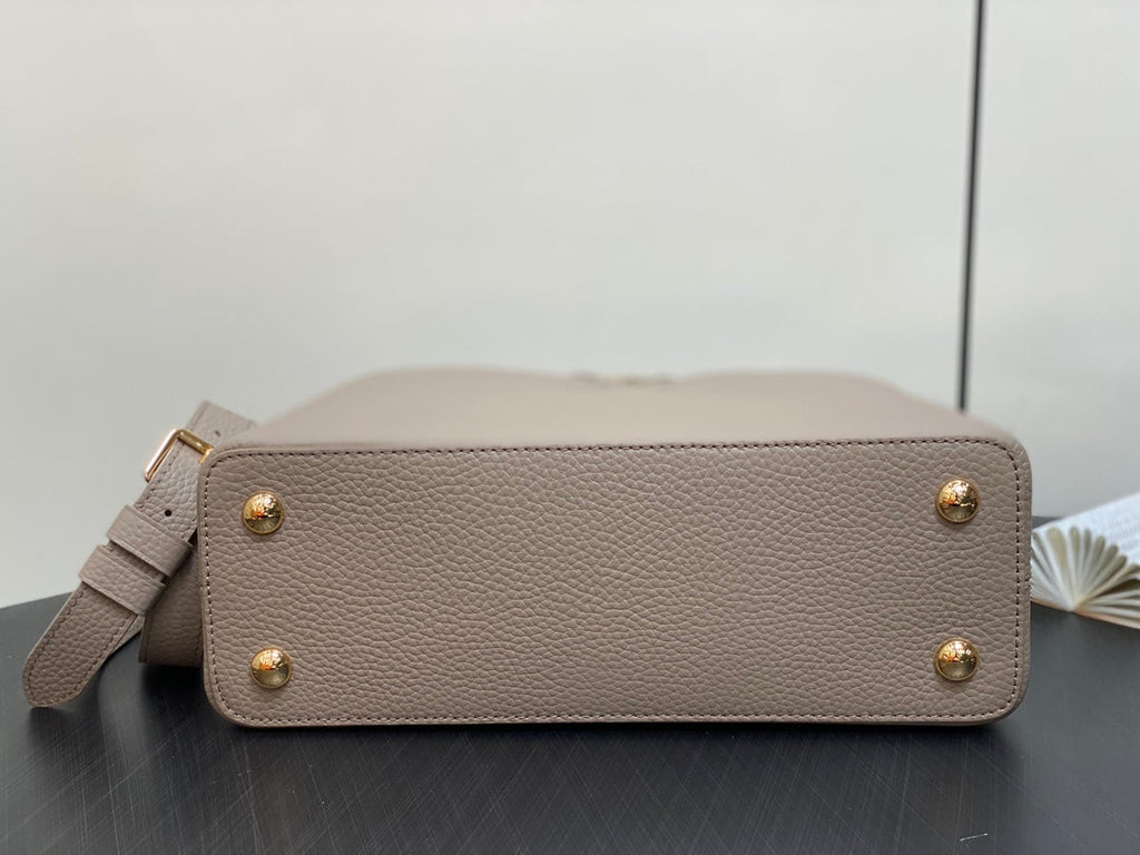 LOUIS VUITTON CAPUCINES MM 31 IN KHAKI BROWN TAURILLON