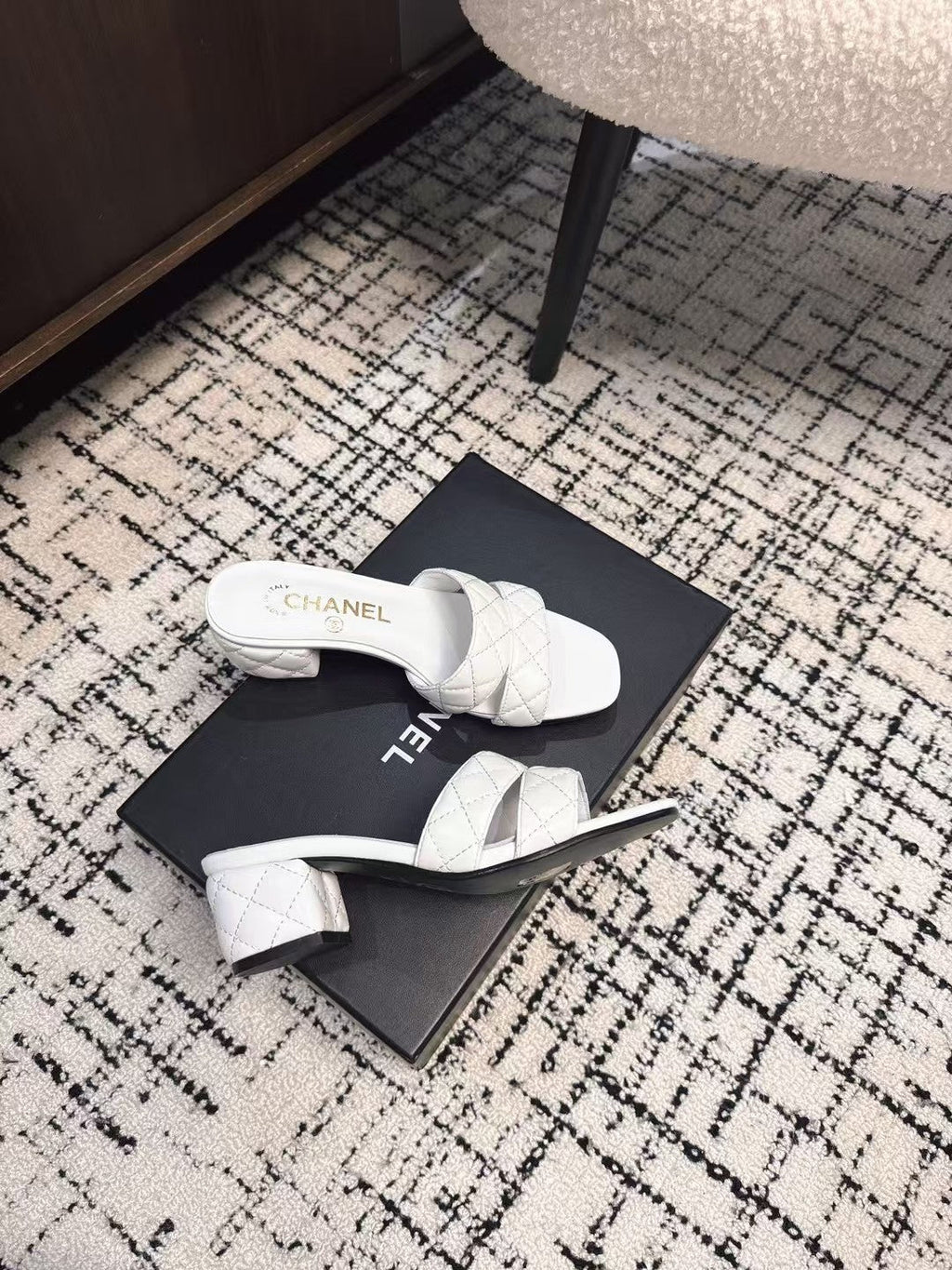 CHANEL MID HEEL MULES IN WHITE SHEEPSKIN