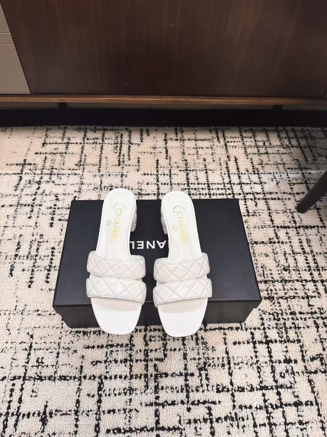 CHANEL MID HEEL MULES IN WHITE SHEEPSKIN