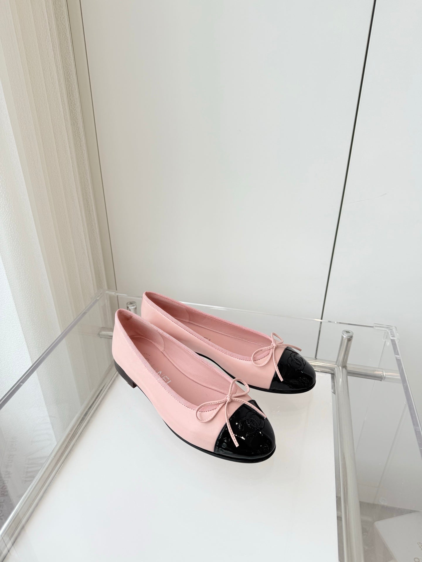 CHANEL BALLET FLAT IN BABY PINK MIX BLACK CALFSKIN