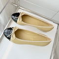 CHANEL BALLET FLAT IN FLAX YELLOW MIX BLACK CALFSKIN
