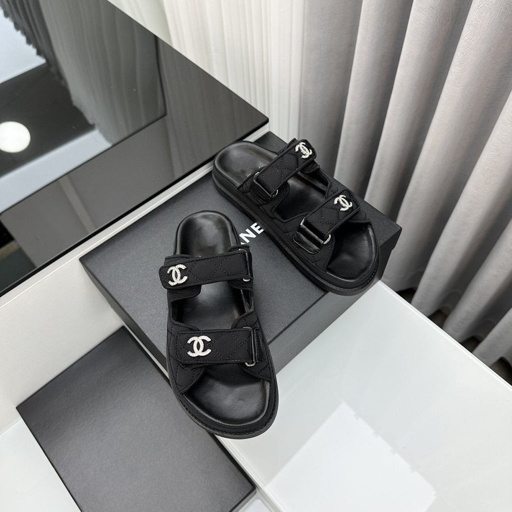 CHANEL dad sandals black textile mules