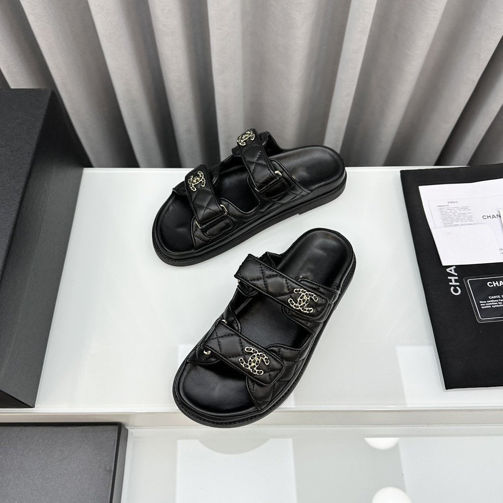 CHANEL dad sandals black lambskin mules