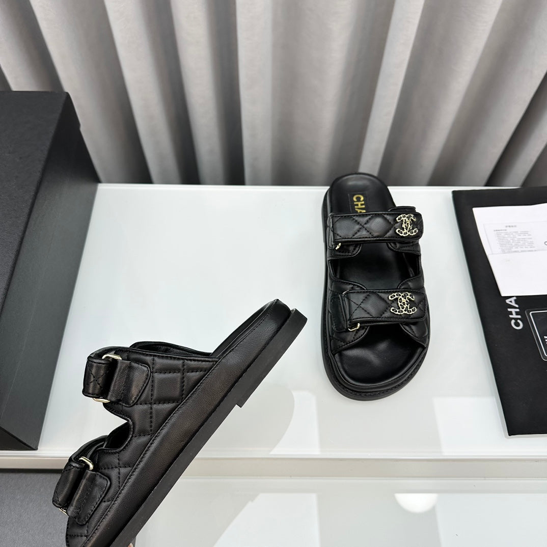 CHANEL dad sandals black lambskin mules