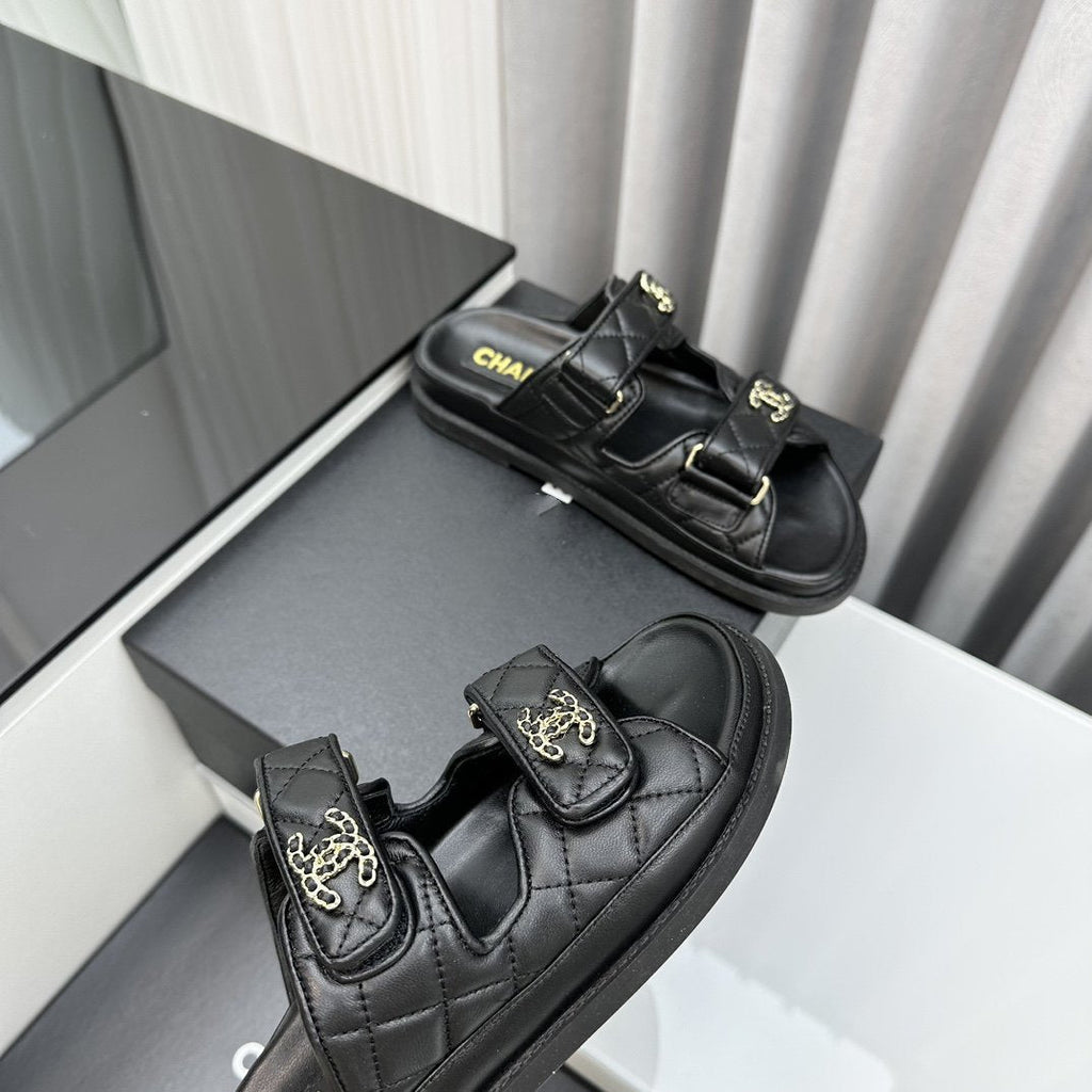 CHANEL dad sandals black lambskin mules