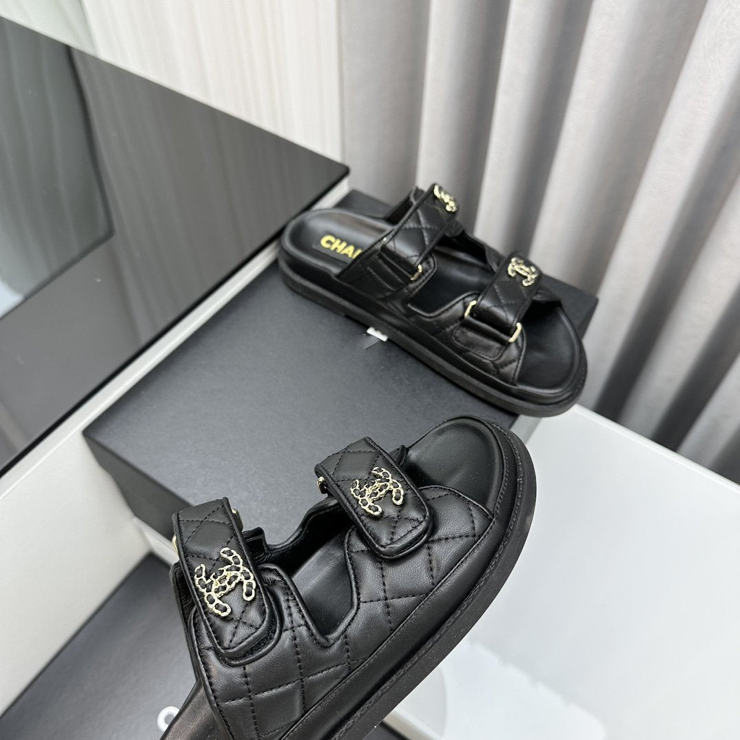CHANEL dad sandals black lambskin mules