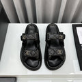 CHANEL dad sandals black patent interwoven leather