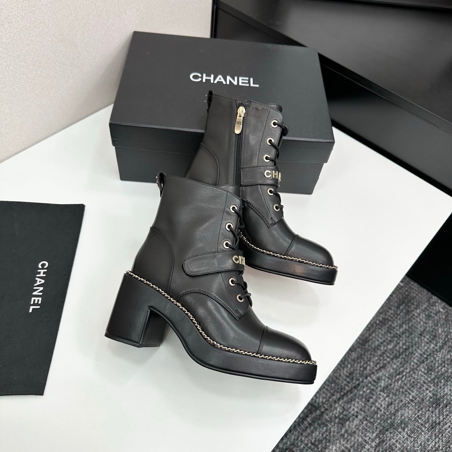 CHANEL 25S LACE-UP HEELED ANKLE BOOTS IN BLACK CALFSKIN