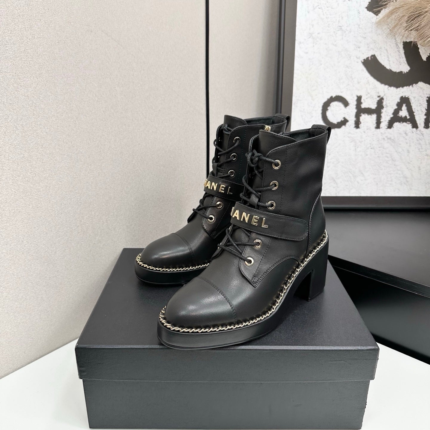 CHANEL 25S LACE-UP HEELED ANKLE BOOTS IN BLACK CALFSKIN
