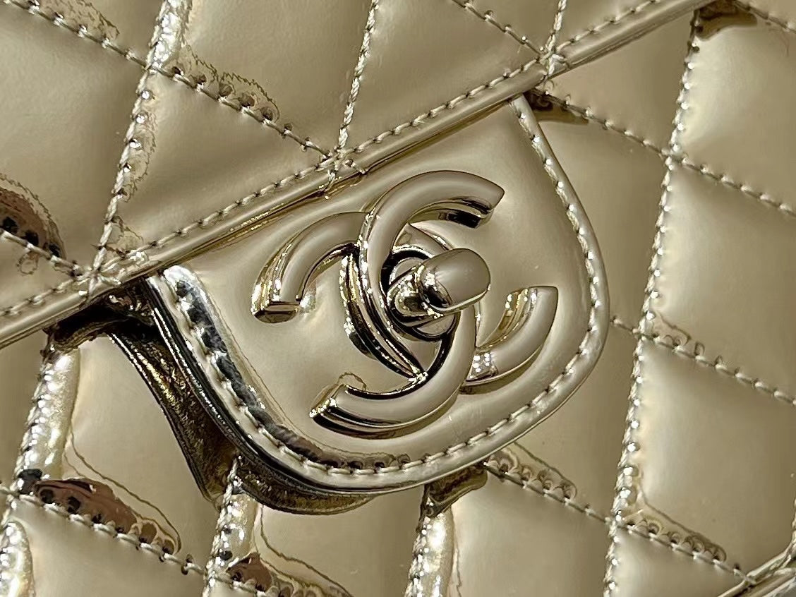CHANEL 25S  STAR GOLD 23 IN METALLIC GOLD CALFSKIN