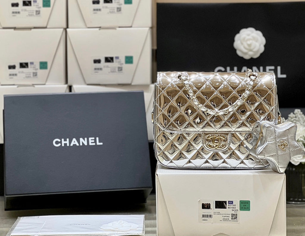 CHANEL 25S  STAR SILVER 23 IN METALLIC SILVER CALFSKIN